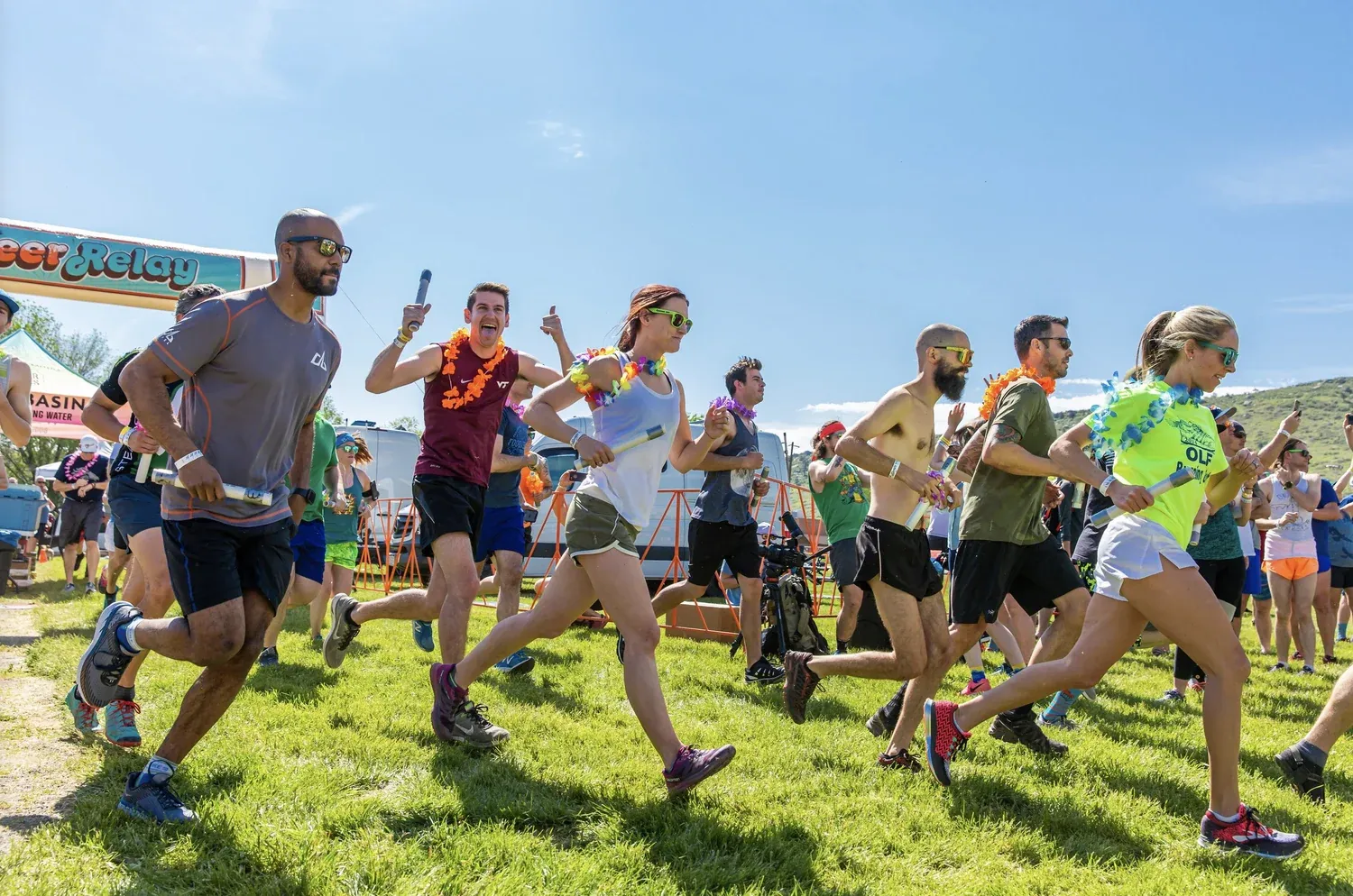 Beer Relay runners charging out of the exchange zone