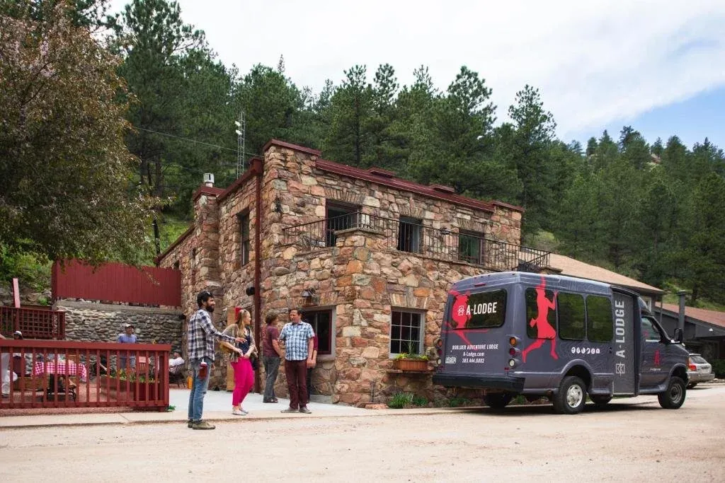 A-Lodge: 91 Fourmile Canyon Dr, Boulder, CO 80302. Remember to grab a sticker!